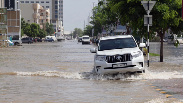 a motorist contends with flooding in the port city of fujairah after unseasonable rains swept through the east of the united arab emirates leaving seven people dead afp a motorist contends with flooding in the port city of fujairah after unseasonable rains swept through the east of the united arab emirates leaving seven people dead afp