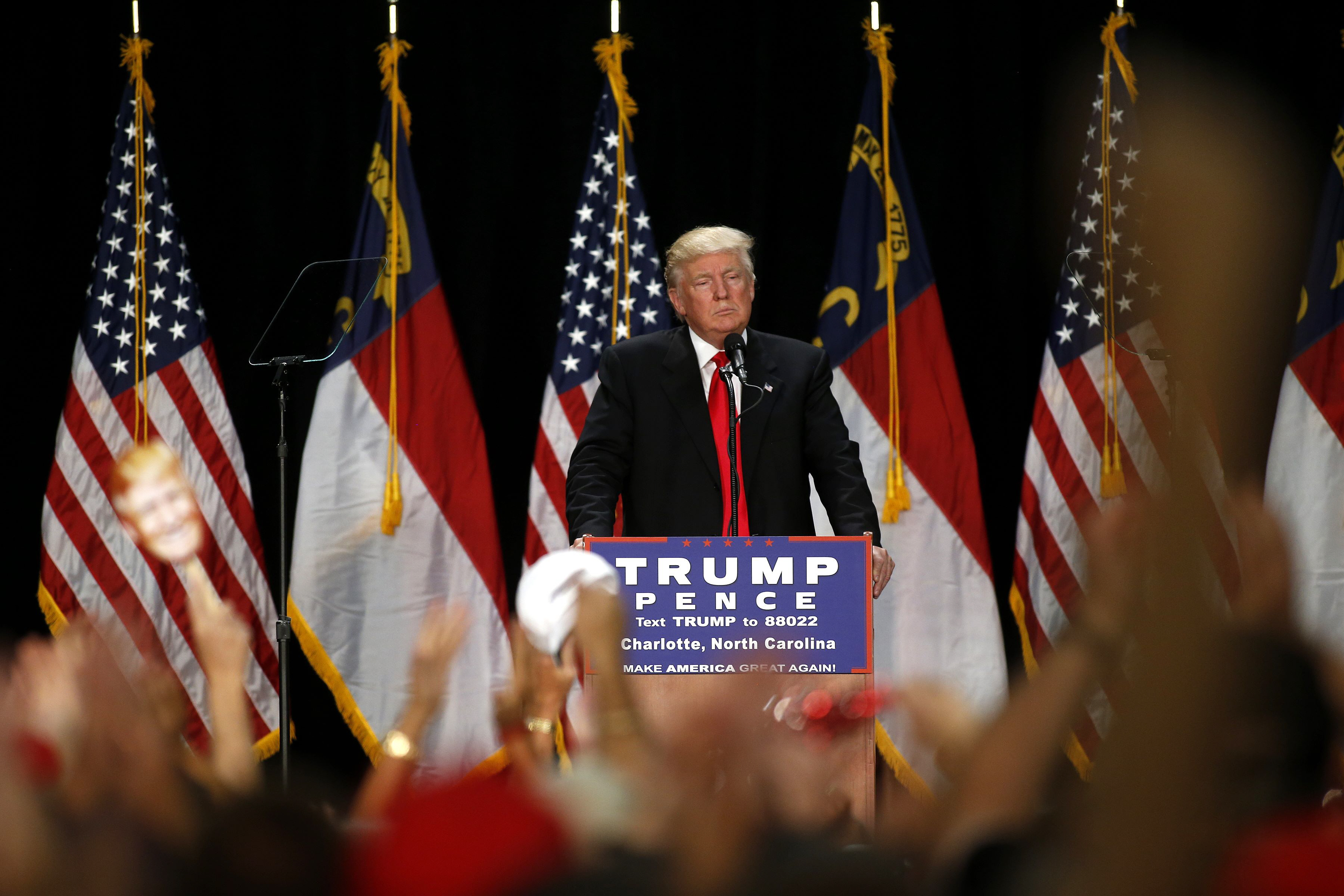 republican presidential candidate donald trump speaks to supporters at a rally on august 18 2016 at the charlotte convention center in charlotte north carolina photo afp