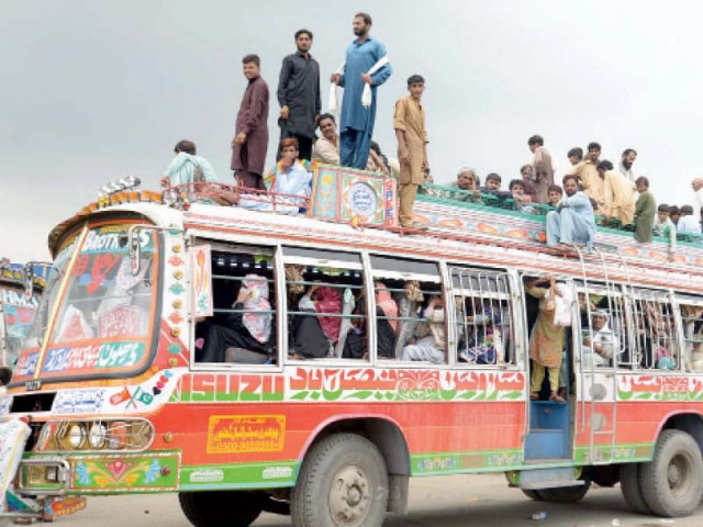 passengers are stranded aboard a bus in faisalabad amid a nationwide transporters strike transporters are protesting against massive tax increases photo online passengers are stranded aboard a bus in faisalabad amid a nationwide transporters strike transporters are protesting against massive tax increases photo online