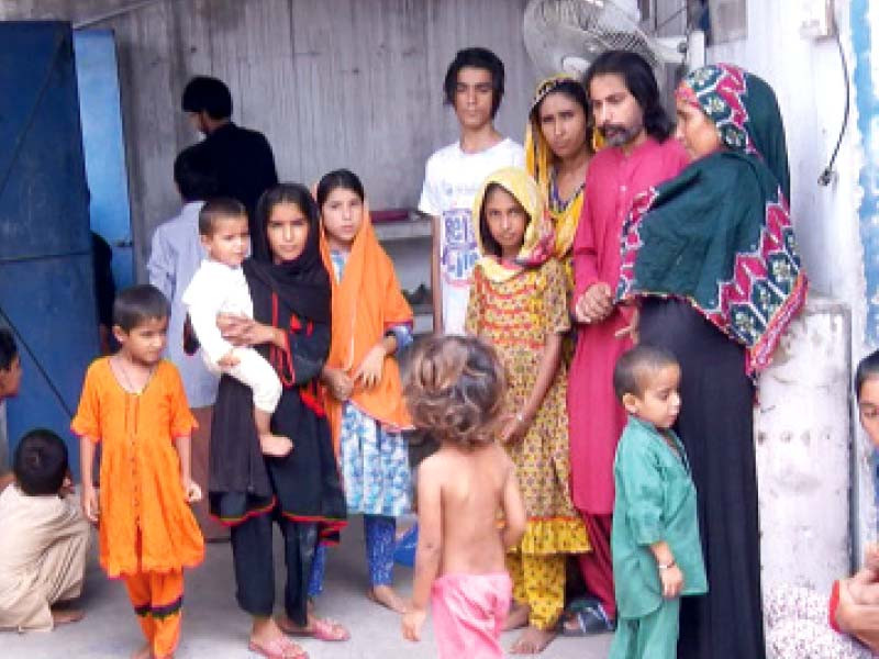 families escaping from deluged areas such as these ones from dadu are being resettled across the country photo express