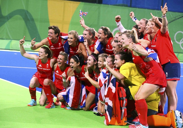 great britain players poses for photos after their gold medal win photo reuters