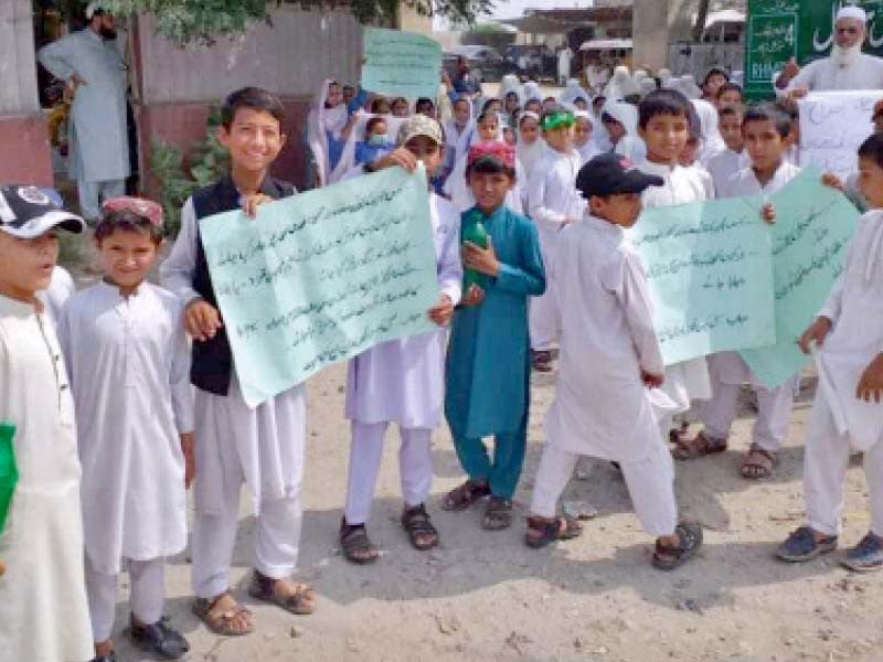 students of community schools protest against the closure of their schools photo express