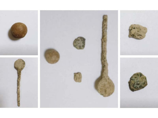 artifacts and antiquities stolen from an archeological site were recovered from members of a gang photos express artifacts and antiquities stolen from an archeological site were recovered from members of a gang photos express