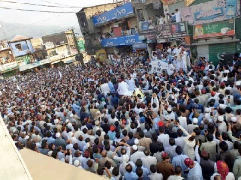 local residents take to the streets in the thousands against the recent wave of militancy in swat photo express