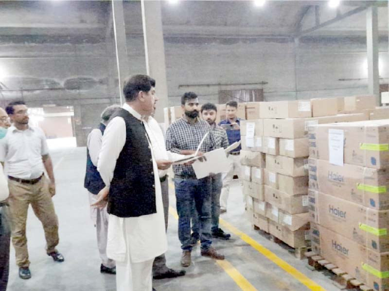 minister for primary and secondary health dr akhtar malik inspects ventilators and other medical equipment stored in a warehouse for over a year photo express