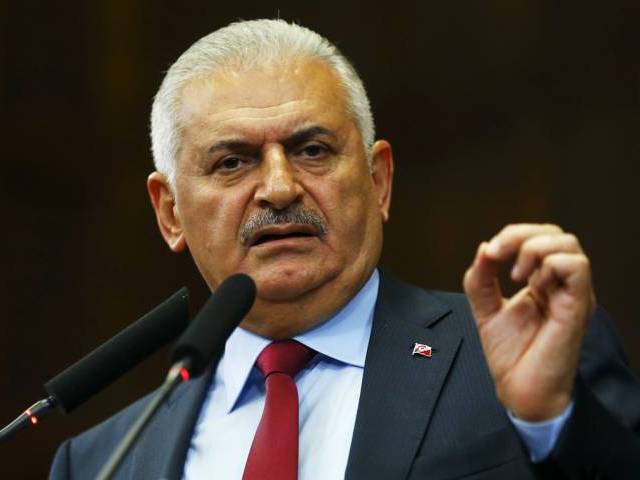 turkish prime minister binali yildrim addresses members of parliament from his ruling ak party akp during a meeting at the turkish parliament in ankara photo reuters