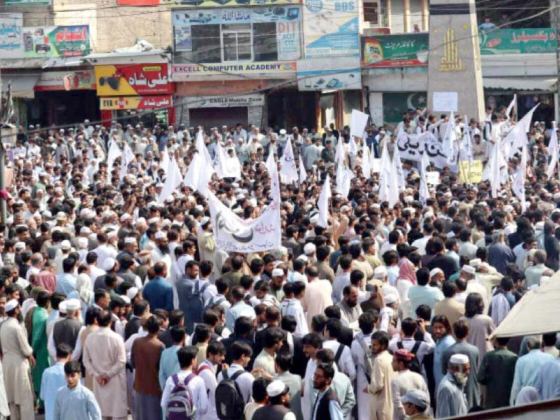 pti workers stage a rally against militancy in matta swat on tuesday photo express