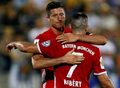 german cup lewandowski treble puts bayern ahead