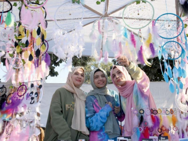 visitors take in handmade items put on display for sale at the two day islamabad women gala photo online visitors take in handmade items put on display for sale at the two day islamabad women gala photo online