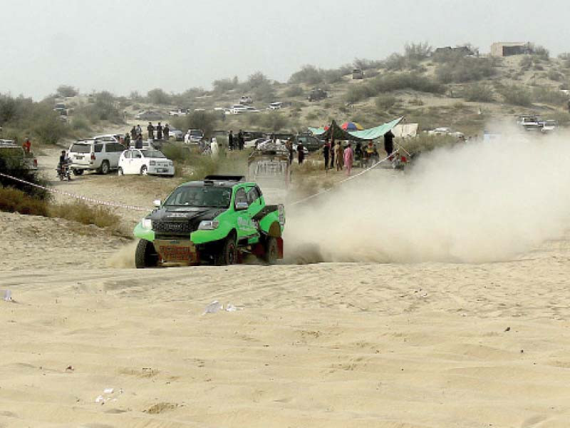 a jeep speeds along the track in changa manga during the 7th thal desert rally the race was organized by the tdcp and features over 110 drivers photo app