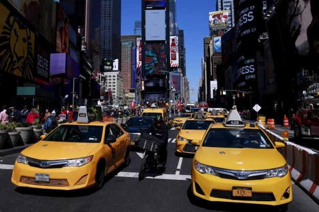 new york city taxi cabs drive through times square in new york photo reuters