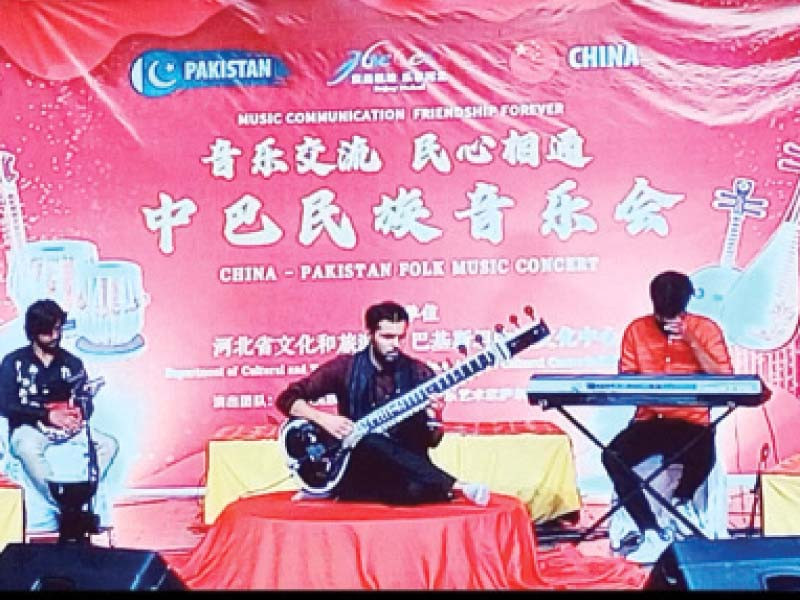 a pakistani folk band is performing at a live concert jointly organised by the pakistani and chinese culture departments to promote pak china ties photo express