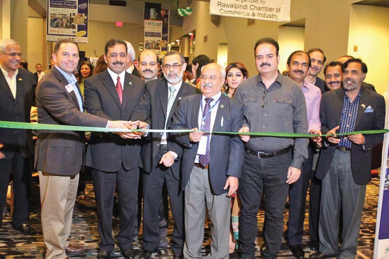 dallas deputy mayor mr tim nelson and pakistan s consul general in us mr afzal mehmood inaugurate the pakistan show with associate director of business development express publications mr saif ul azam and mr humayun pervaiz and mr khursheed barlas of the rawalpindi chamber of commerce photo express