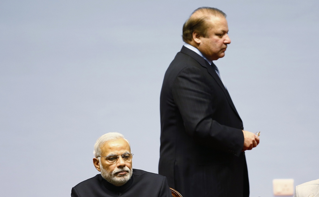 prime minister nawaz sharif walks past his indian counterpart modi during the opening session of the 18th saarc summit in kathmandu photo reuters