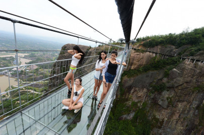 china opens longest glass bottom bridge in world