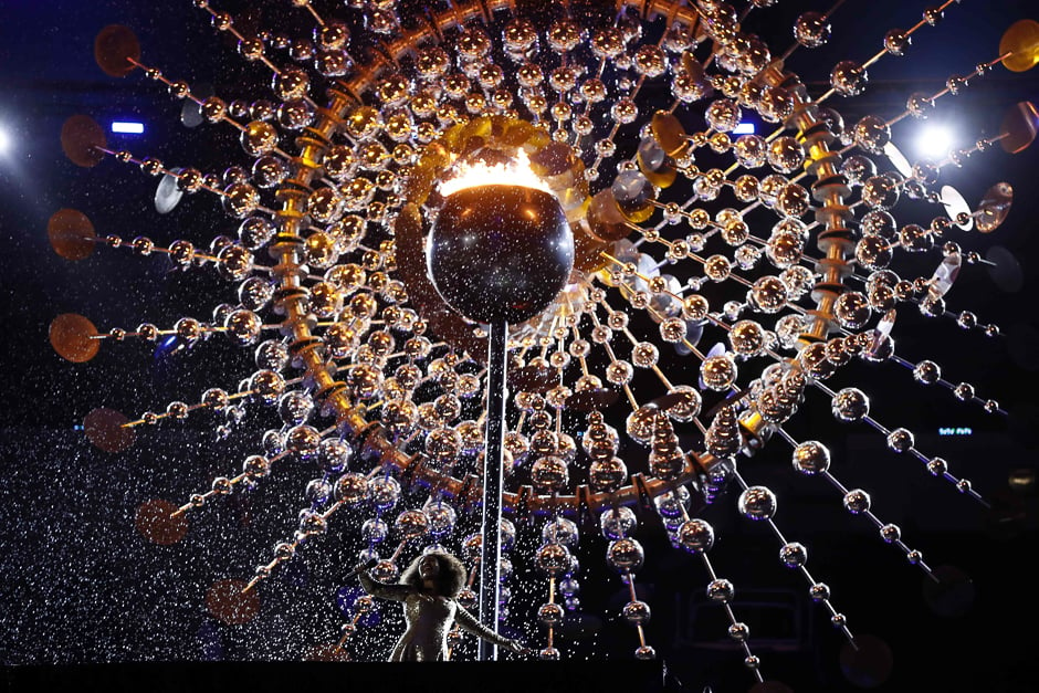 a false rain on the olympic flame during the closing ceremony of the rio games photo afp