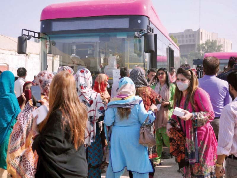 female passengers wait to board the newly launched pink bus service in hyderabad on saturday photo ppi