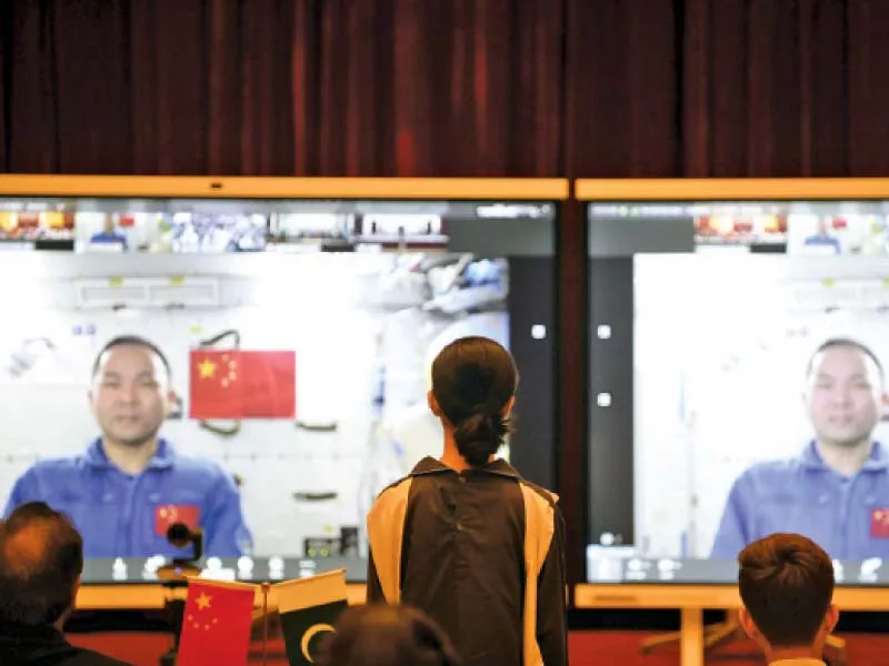 a student from islamabad model college for girls interacts with a chinese astronaut photo express a student from islamabad model college for girls interacts with a chinese astronaut photo express