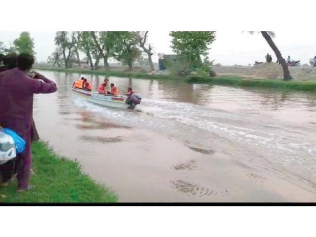 rescue workers scour the canal in a boat during a search for the accident victims photo express rescue workers scour the canal in a boat during a search for the accident victims photo express