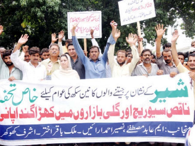 residents of nain sukh area protest poor sewerage in front of the provincial assembly on tuesday photo express residents of nain sukh area protest poor sewerage in front of the provincial assembly on tuesday photo express