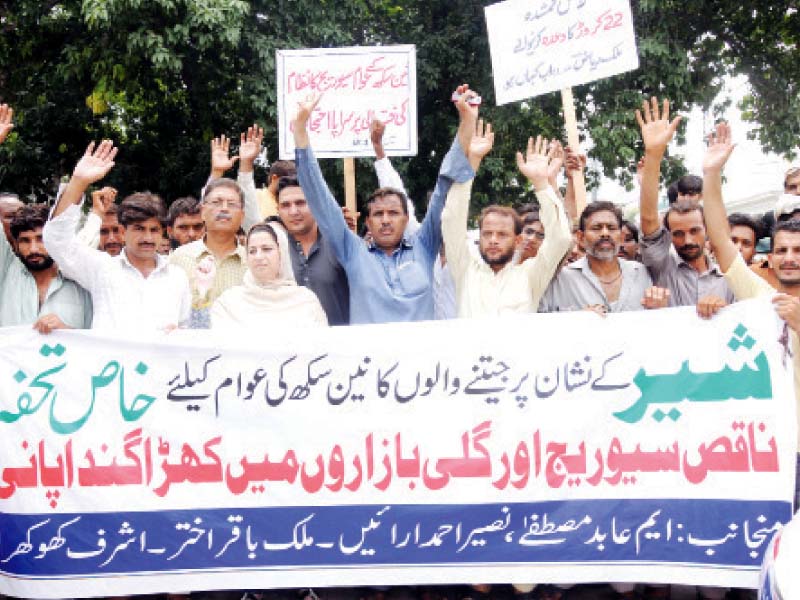 residents of nain sukh area protest poor sewerage in front of the provincial assembly on tuesday photo express