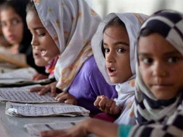 the minister said he was glad to see students hard at work at the workers welfare girls high school photo reuters the minister said he was glad to see students hard at work at the workers welfare girls high school photo reuters