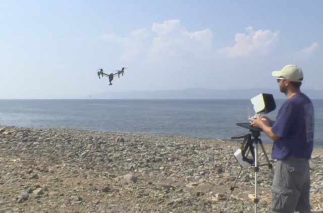 refugee who made it returns with drone to halt drownings