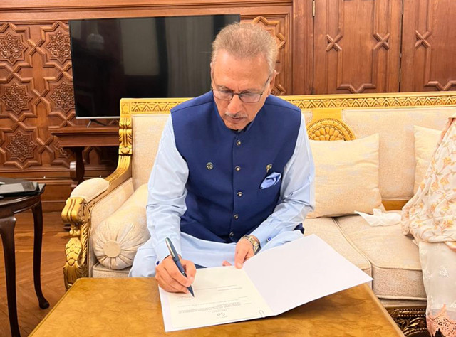 president dr arif alvi signing the dissolution of the national assembly in terms of article 58 1 of the constitution of pakistan 1973 in lahore on wednesday august 9 2023 photo express