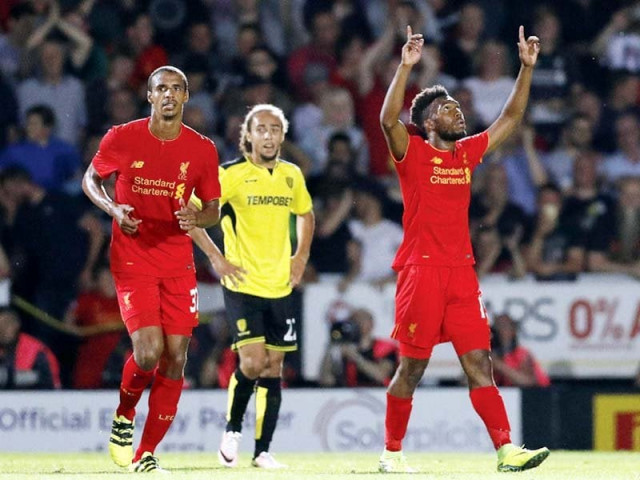 divock origi roberto firmino and sturridge all scored as liverpool last season s beaten finalists crushed championship side burton who are managed by ex liverpool midfielder nigel clough photo afp divock origi roberto firmino and sturridge all scored as liverpool last season s beaten finalists crushed championship side burton who are managed by ex liverpool midfielder nigel clough photo afp
