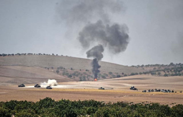 turkish army tanks and pro ankara syrian opposition fighter trucks positioned two kilometres west from the syrian turkish border town of jarabulus photo afp turkish army tanks and pro ankara syrian opposition fighter trucks positioned two kilometres west from the syrian turkish border town of jarabulus photo afp