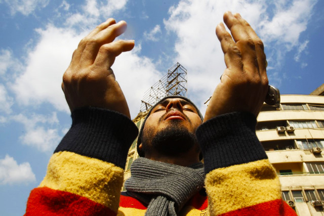 an egyptian anti government protester prays at tahrir square in downtown cairo january 31 2011 photo reuters an egyptian anti government protester prays at tahrir square in downtown cairo january 31 2011 photo reuters