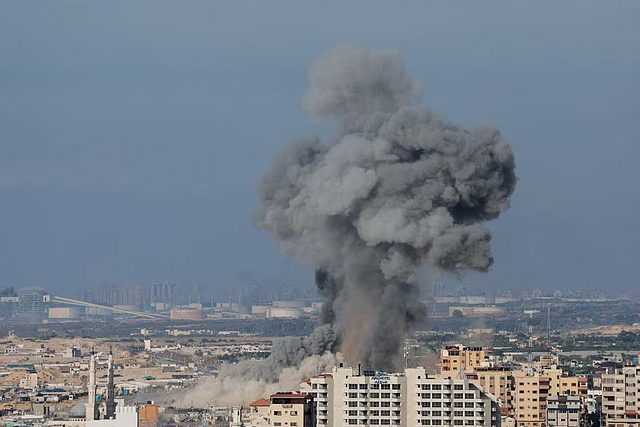 Smoke rises following Israeli strikes in Gaza, October 7, 2023. (REUTERS)