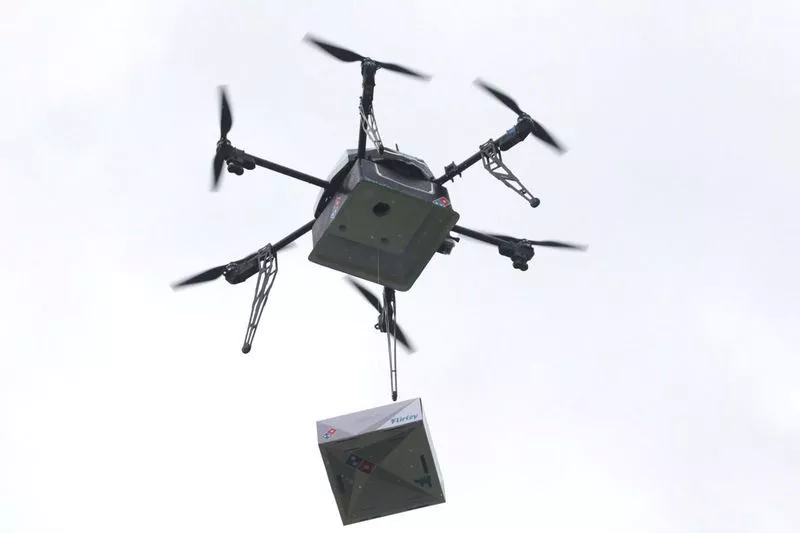 a delivery drone performs a test flight with a domino 039 s pizza box in auckland new zealand august 25 2016 photo reuters a delivery drone performs a test flight with a domino 039 s pizza box in auckland new zealand august 25 2016 photo reuters