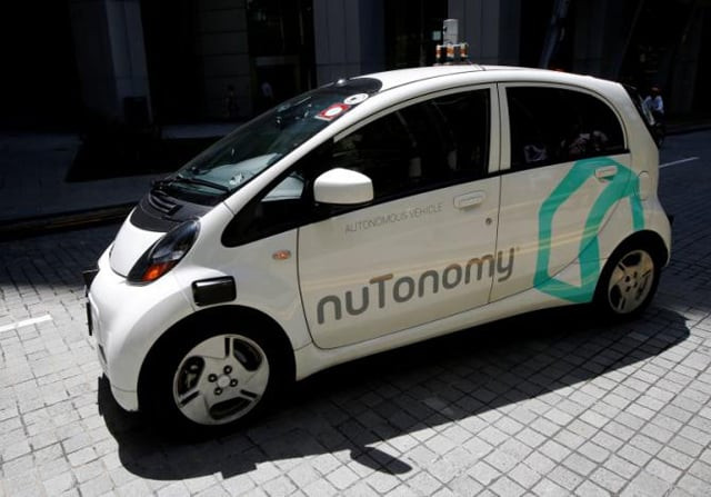 a nutonomy self driving taxi drives on the road in its public trial in singapore august 25 2016 photo reuters a nutonomy self driving taxi drives on the road in its public trial in singapore august 25 2016 photo reuters