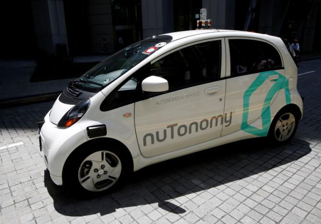 a nutonomy self driving taxi drives on the road in its public trial in singapore august 25 2016 photo reuters