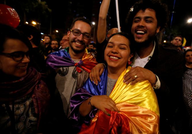 people celebrate after colombia 039 s government and revolutionary armed forces of colombia farc rebels reached a final peace deal on wednesday to end a five decade war in bogota colombia august 24 2016 photo reuters