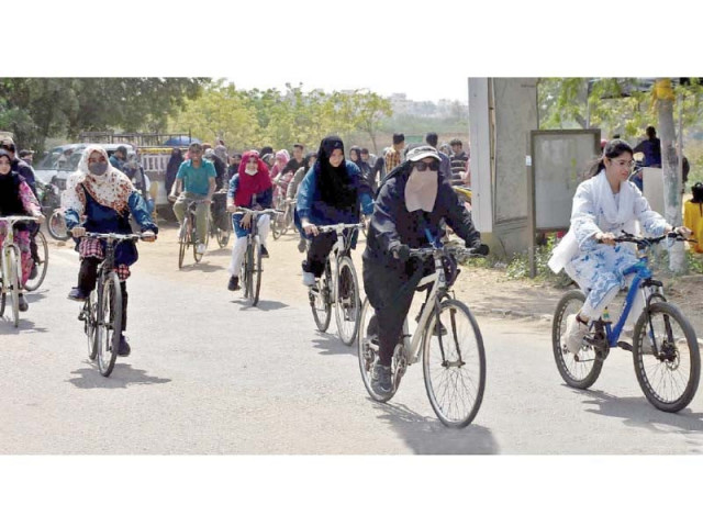 girl students take part in a cycle rally in the university of karachi to promote bicycles as a means of transportation within the campus photo express girl students take part in a cycle rally in the university of karachi to promote bicycles as a means of transportation within the campus photo express