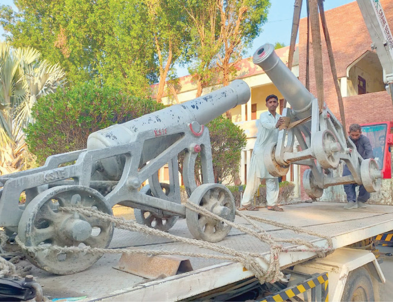 cannons are being loaded on a truck to shift them back to the kot diji fort photo express
