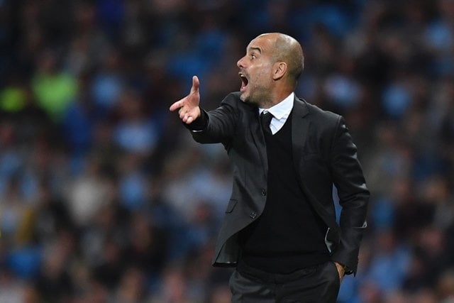 pep guardiola gestures from the touchline at the etihad stadium in manchester england on august 24 2016 photo afp