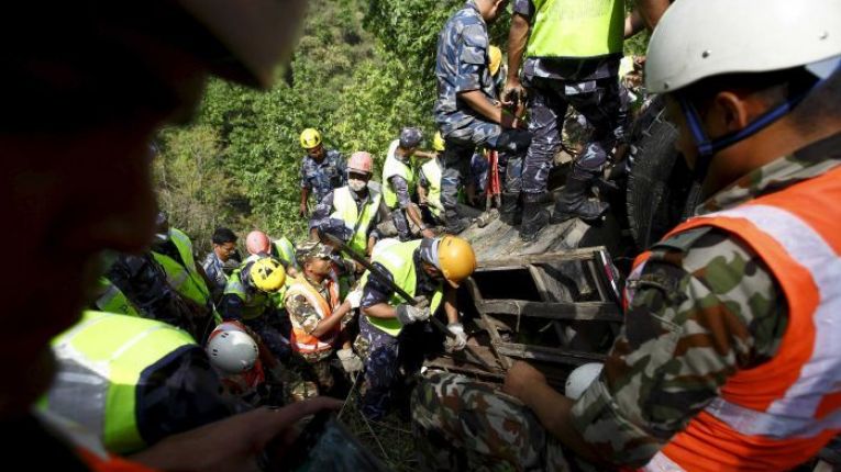 in this file photo rescue teams work to recover the bodies of victims from the wreckage of a bus at jayaprekhola in dhading district on the outskirts of kathmandu nepal photo reuters