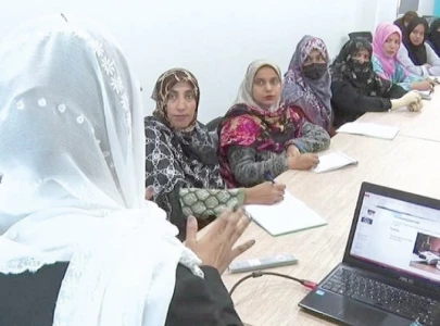 women take the wheel of pink buses