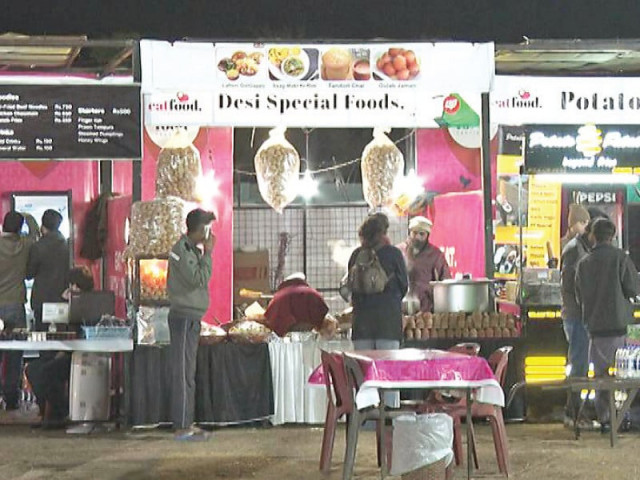 vendors prepare a variety of dishes to serve at the islamabad eat food festival in islamabad photo express vendors prepare a variety of dishes to serve at the islamabad eat food festival in islamabad photo express