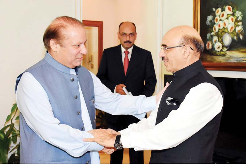 pm nawaz sharif congratulates masood khan on becoming the president of ajk at the pm house in islamabad photo nni