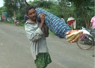 indian man carries late wife s body for 10 kilometres