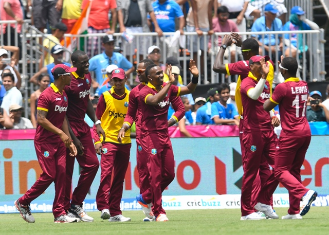 west indies players celebrate winning the match off the last ball at central broward stadium in fort lauderdale florida on august 27 2016 photo afp