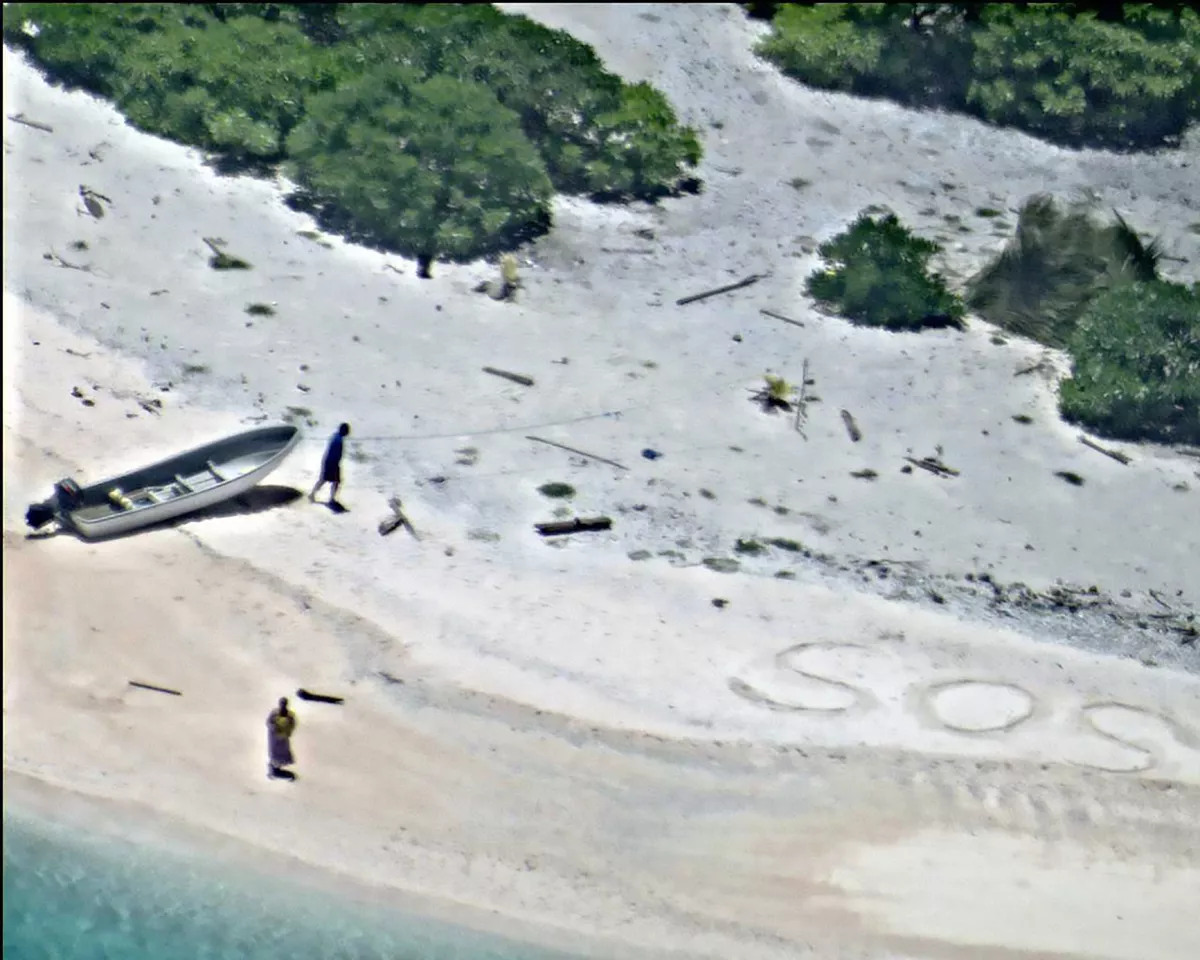 this image obtained courtesy of the us navy shows a pair of stranded mariners signalling for help by writing quot sos quot in the sand as a us navy p 8a poseidon aircraft crew from patrol squadron vp 8 flies over in support of a coast guard search and rescue mission august 25 2016 on east fayu isalnd micronesia photo afp this image obtained courtesy of the us navy shows a pair of stranded mariners signalling for help by writing quot sos quot in the sand as a us navy p 8a poseidon aircraft crew from patrol squadron vp 8 flies over in support of a coast guard search and rescue mission august 25 2016 on east fayu isalnd micronesia photo afp