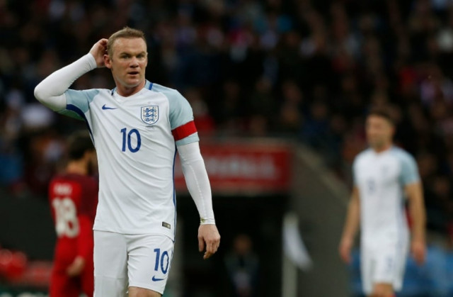 rooney was appointed captain in august 2014 after gerrard retired from international football photo afp rooney was appointed captain in august 2014 after gerrard retired from international football photo afp