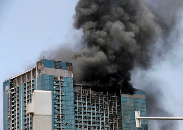 smoke rises after a fire broke out in a building at al maryah island in abu dhabi uae august 30 2016 photo reuters smoke rises after a fire broke out in a building at al maryah island in abu dhabi uae august 30 2016 photo reuters