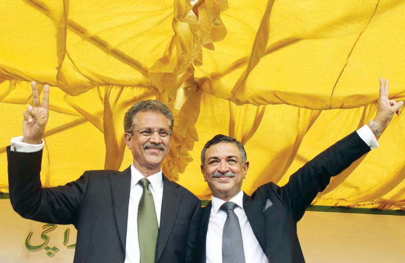 wasim akhtar and arshad vohra pose after taking oaths the key of the city which was presented to the mayor by the kmc administrator below photos athar khan express