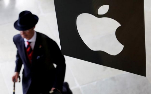 a customer enters the new apple store which is the world 039 s largest on its opening day at covent garden in london photo reuters a customer enters the new apple store which is the world 039 s largest on its opening day at covent garden in london photo reuters